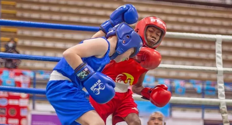 Kwaca Na Vatu Boxing Club’s Esava Tuivodo (right) lands a right hook on Australian’s Riley Jackson during the Tri Nations Championship at Suva’s FMF Gymnasium on June 27, 2025. Photo: Josua Buredua