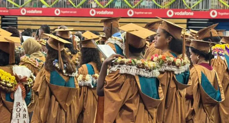 A photograph of University of the South Pacific graduates standing together, dressed in graduation attire at Vodafone Arena, Suva on April, 2025.