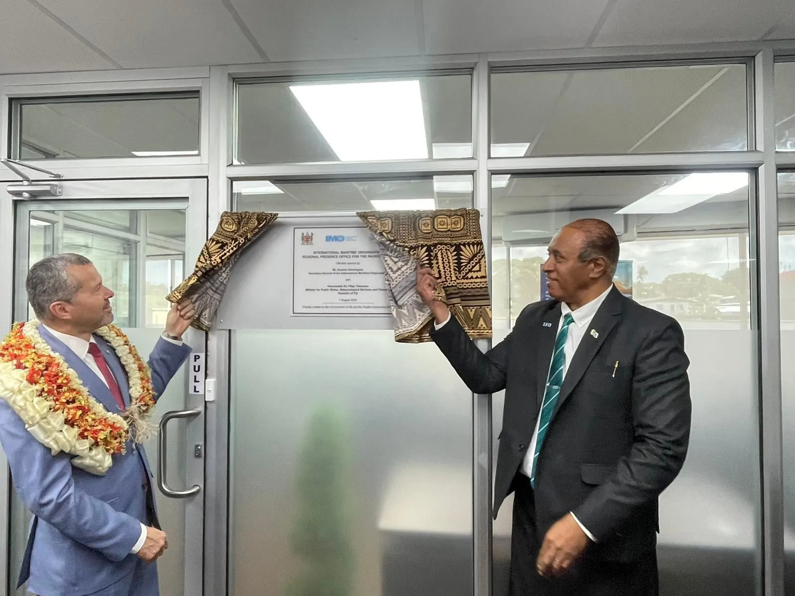 From left, Arsenion with Minister Tuisawau 