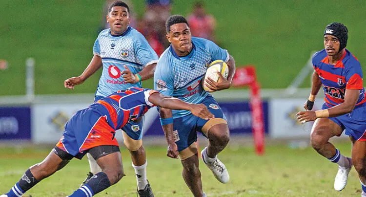A Nasinu Secondary School rugby player runs with the ball in the Southern Zone Under-18 final. 